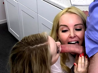 Two blondes are making out while being fucked by a doctor